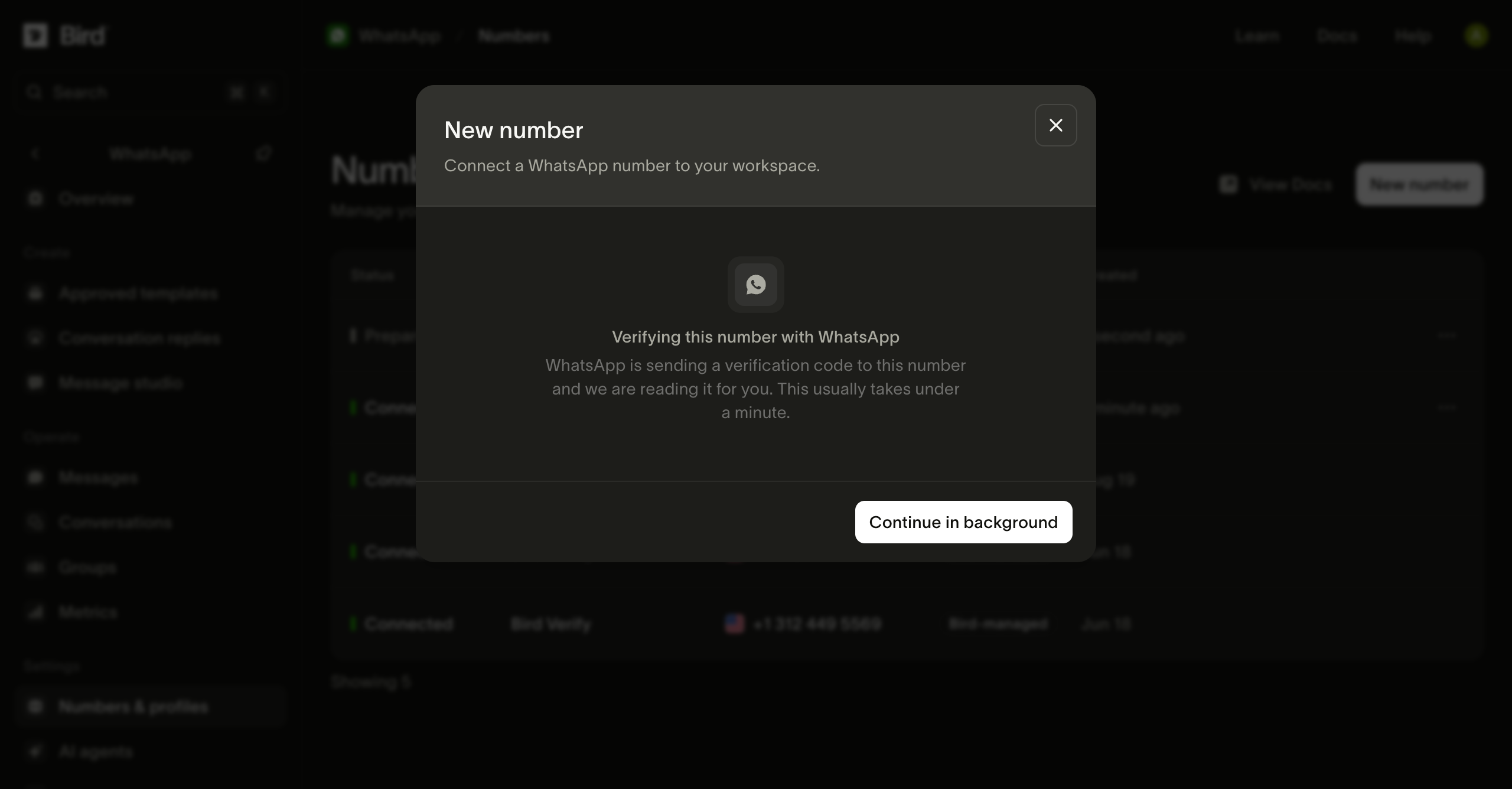 Bird verifying the selected number with WhatsApp, with a Continue in background button.